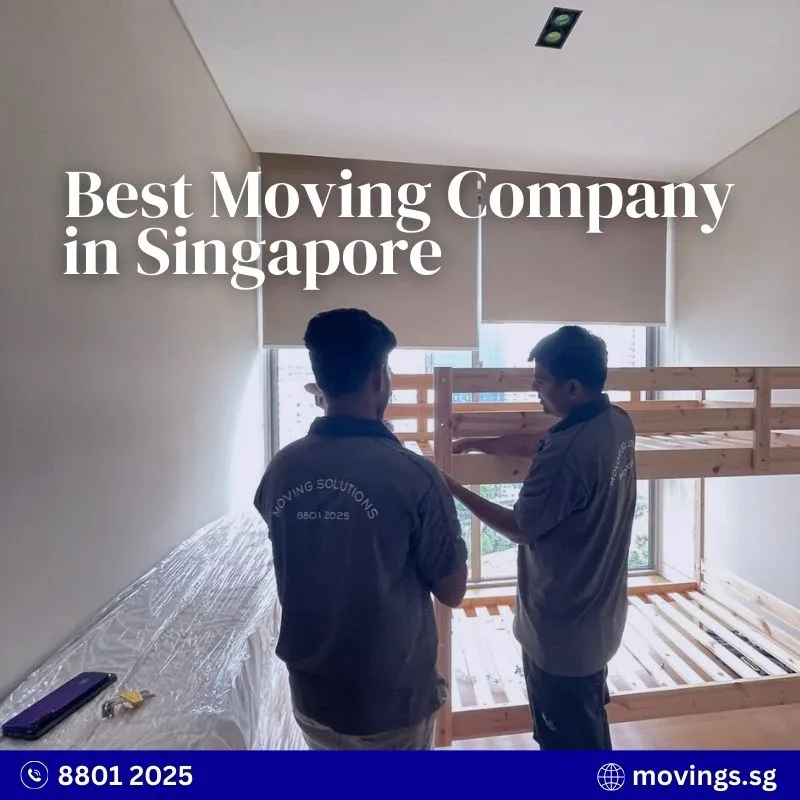 Professional movers handling a double deck bed during a home move in Singapore