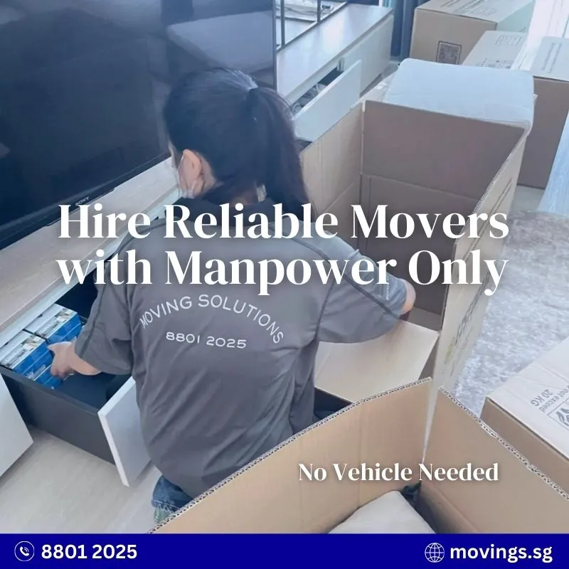 Moving Solutions staff packing household items from drawers into boxes in Singapore