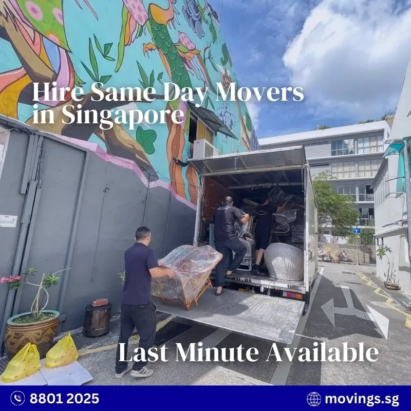 Movers loading furniture into a container truck for an urgent home move in Singapore